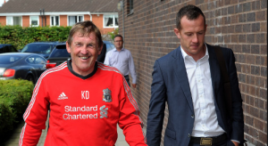 Kenny Dalglish with Charlie Adam